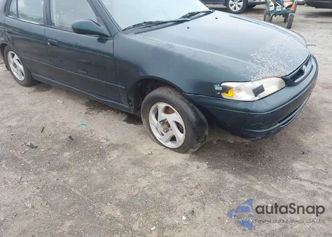 1999 Toyota Corolla Le из США, поврежденный, VIN 2T1BR12E4XC124432